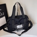 Black travel gym bag with adjustable shoulder strap and mesh side pocket - Black