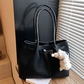 Classic black woven tote bag in PU leather featuring a cute white sheep charm pendant - With Charm / Black