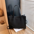 Bolso tote negro de gran capacidad en tela texturizada con ribetes de cuero mate - Negro