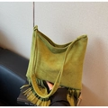 Detail of green suede hobo bag with long fringes and double slim shoulder straps - Green