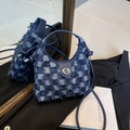 Blue and white checkered denim bucket bag with fringe trim and silver circular lock - Dark Blue
