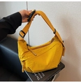 Detail of yellow nylon crossbody dumpling bag featuring woven zipper and buckle strap - Yellow