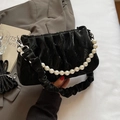 Chic black pleated cloud bag with elegant pearl chain and scrunchie strap detail - Black