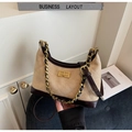 Close-up of khaki suede hobo bag featuring diamond quilting and gold chain strap - Khaki