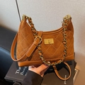 Brown suede shoulder bag with diamond quilting, gold chain strap, and turn-lock closure - Brown