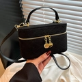 Chic black quilted velvet crossbody bag with gold-tone dual zippers and top handle - Black