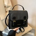 Sac à dos rétro chic bicolore gris foncé et noir avec boucles dorées raffinées - Noir