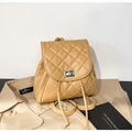 Quilted faux leather backpack with silver twist lock and drawstring on trench coat - Quilted Rhombus Backpack / Khaki