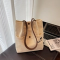 Minimalist cream canvas tote bag with brown handles and Docile Girl embroidery - Khaki