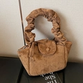 Bolso tipo cubo plisado en cuero marrón esmerilado con un diseño único de asa de anillo - Marrón