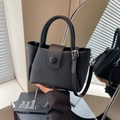 Schicke schwarze Handtasche mit Ledermuster und verstellbarem Schultergurt - Schwarz