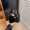 Quilted black leather shell bag with gold clasp, chain strap and Muting logo charm - Black with Pendant