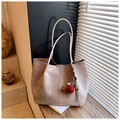 Detail of apricot suede tote bag featuring colorful faux fur pompom fringe charm - Khaki (With Pendant)