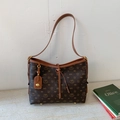 Borsa a secchiello in pelle marrone scuro con motivi floreali e spalline caramello - Marrone
