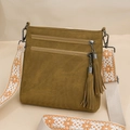 Detail of canvas crossbody bag showing dual zip pockets and floral knit wide strap - Yellow