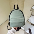 Compact mint green nylon mini backpack with adjustable black straps for daily travel - Green