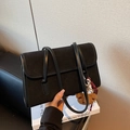 Black rectangular underarm bag in matte and smooth leather with a cute bear charm - Black
