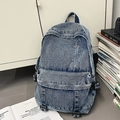 Zaino minimalista in denim blu per studenti con lavaggio vintage e tasca frontale - Blu