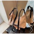 Detailed view of frosted khaki shoulder bag with vintage wooden bead charm and strap - Khaki With Pendant