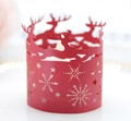 Detailed laser-cut red paper candle wrap featuring Christmas deer and snowflake patterns - Pearlescent Red