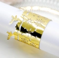 Elegantes servilleteros dorados calados con diseños de renos y copos de nieve - Oro Reflectante