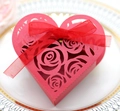 Hollow rose laser-cut heart candy box in red with silk ribbon on a white plate - Pearlescent Red