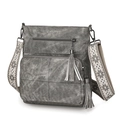Detail view of grey vintage crossbody bag featuring double tassels and jacquard strap - Gray