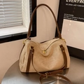 Minimalist beige suede tote bag with brown leather handles and adjustable shoulder strap - Khaki
