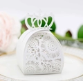 White laser-cut crown wedding favor box with floral patterns on gold rim tray - White