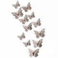 Detail showing 12 rose gold 3D hollow butterfly wall stickers with intricate wing patterns - Pack (12 Units) / Mirror Grey