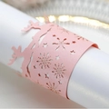 Pink laser-cut Christmas napkin ring with reindeer and snowflake pearlized paper patterns - Pink