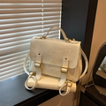 Vintage off-white faux leather backpack with double buckle flap and top handle - Off White