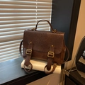 Retro dark brown large capacity faux leather backpack with metallic buckle and handle - Brown