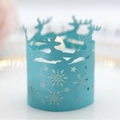 Light blue reindeer and snowflake paper tea light holder with warm LED candle light glow - Tiffany Blue