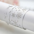 Laser cut pearl white paper napkin ring featuring snowflake and reindeer patterns - White