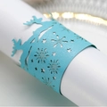 Light blue laser-cut paper napkin ring with reindeer and snowflake holiday patterns - Tiffany Blue