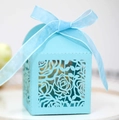 Detailed laser-cut rose pattern on light blue favor box with organza ribbon bow - Tiffany Blue