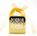 Elegant hollow floral gold wedding favor box with a satin ribbon on white background - Reflective Gold
