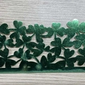 Hollow green clover napkin rings with metallic finish for festive wedding party decor - Reflective Green