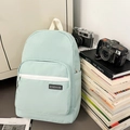 Sac à dos vert menthe de grande capacité avec poche avant blanche et étiquette logo - Vert