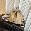 Khaki drawstring bucket backpack in durable canvas with dark brown leather accents - Khaki