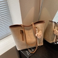 Beige tote bag with brown leather trim and cute teddy bear charm in warm indoor lighting - Khaki (With Pendant)