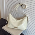 Chic cream white leather hobo underarm bag with glossy finish and silver logo - Off White