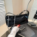 Chic black patent leather bucket bag with silver metal ring and chain strap detail - Black