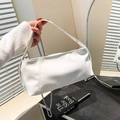 White leather bucket bag with silver chain strap and adjustable wide shoulder strap - White