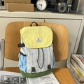 Retro multi-color patchwork casual backpack with nylon texture on a wooden chair - Yellow Small