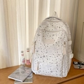 Cream student backpack featuring black star patterns and multi-pocket design - White