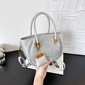 Chic silver grey faux leather bucket bag with top handles and a detachable strap - Silver (With Pendant)