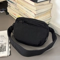 Water-resistant black nylon crossbody bag with multi-layer zipper pockets for sports - Black