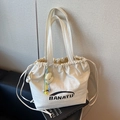 Off-white canvas drawstring tote bag with BANATU logo and yellow moon pendant - White with Pendant